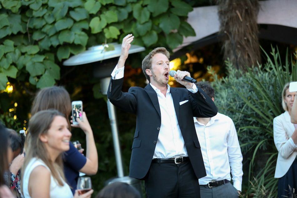 Operatico male opera singer performing at a London event