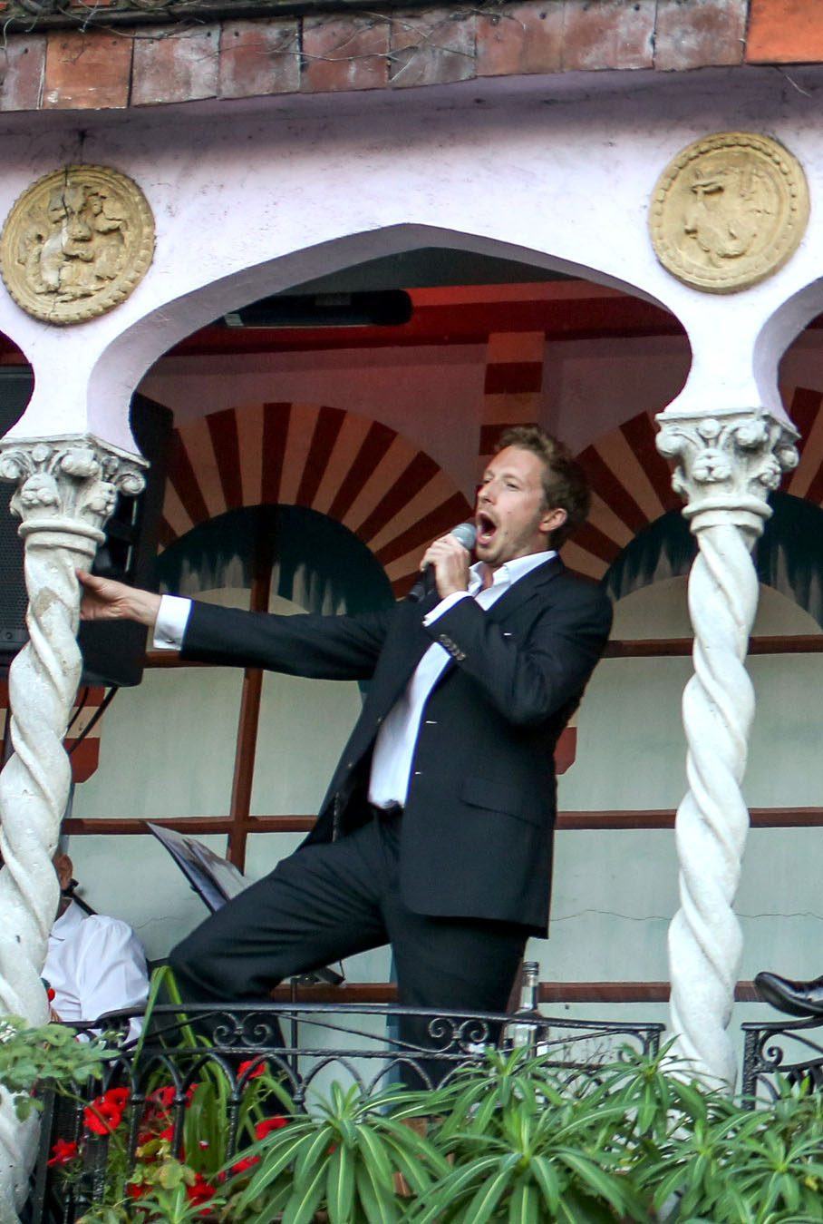 Operatico singing waiters performing opera at a London event